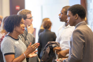 Image of lawyers and law students talking