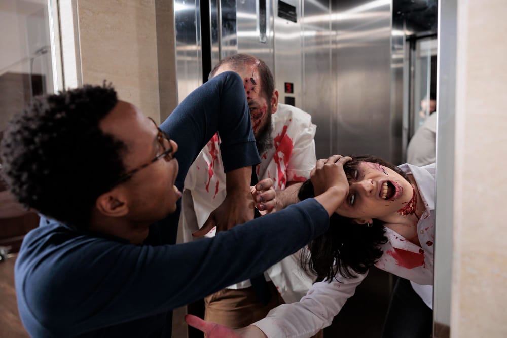  A person standing in front of an elevator door, looking concerned as the door is closing too quickly.