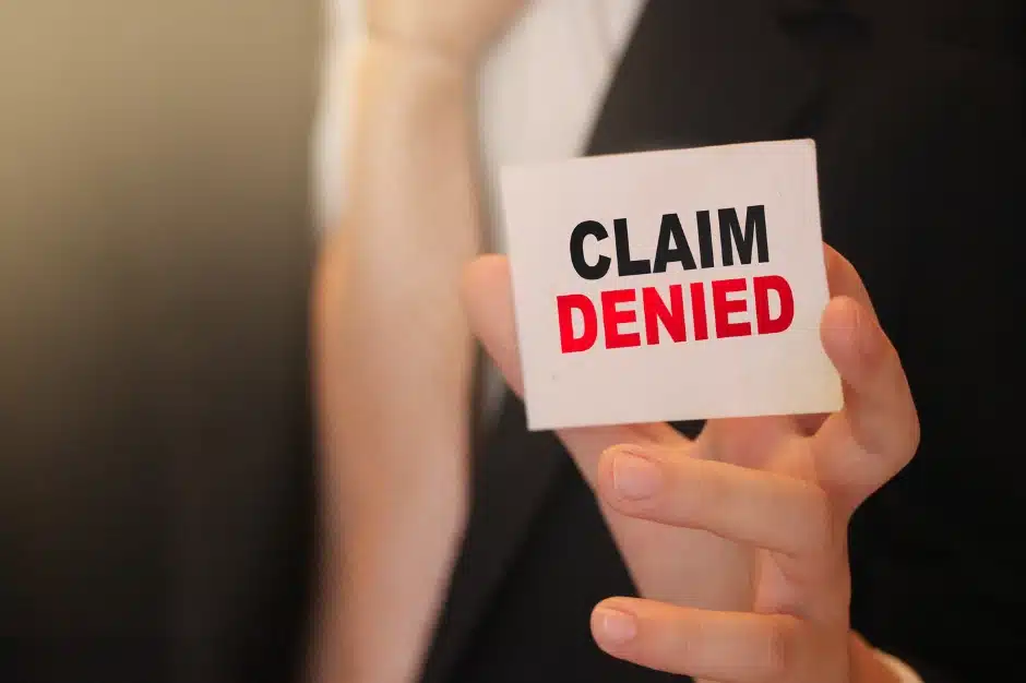 Can You Appeal a Workers' Compensation Decision? 2 appeal a workers compensation decision, Disparti Law Group, image of someone holding card reading 'claim denied'