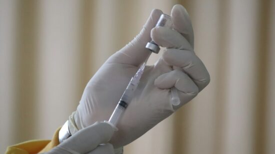 taking sinovac covid-19 vaccination injection